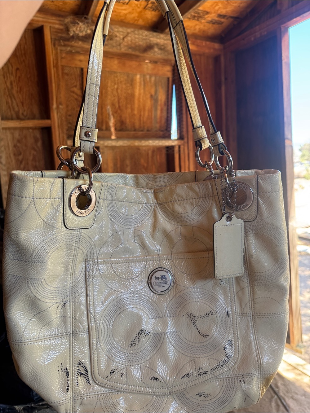 Coach Cream Leather Tote with Signature Circle Pattern